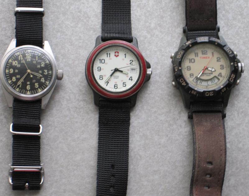 (L-R) Military, Swiss Army brand, Timex. (The bands on the Military and Swiss Army watches are not the originals).