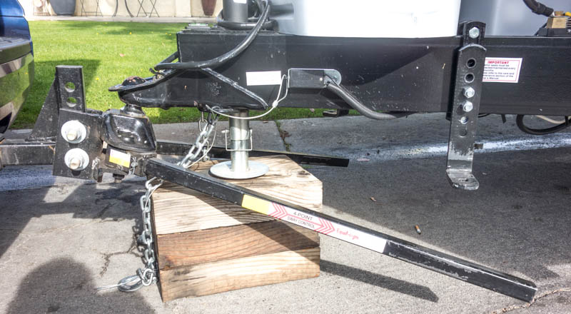 The WD hitch ball is at an angle, which forces the spring bars to point to the ground -- we need this leverage to pull up on the hitch and rear of the truck.