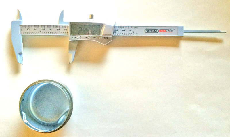 measuring prepared cap with a caliper