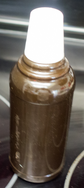 Re-purposed P.E.T.E. heavy duty fuel bottle originally contained prescription mouth wash.